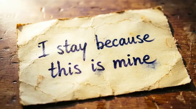 Scrap paper handwritten sentence wooden table reason commitment (AI-generated illustration)