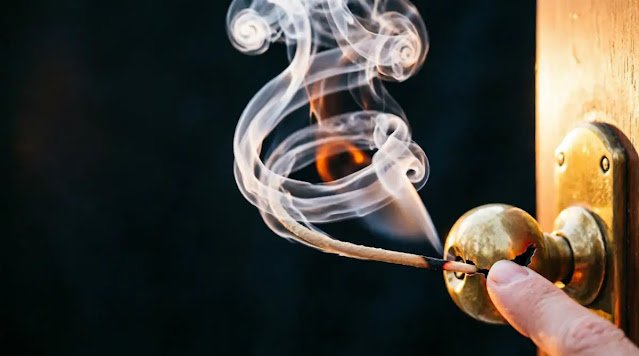 Smoke spiral, finger touching dissolving doorknob, widening gap, rim light, ember glow (AI-generated illustration)